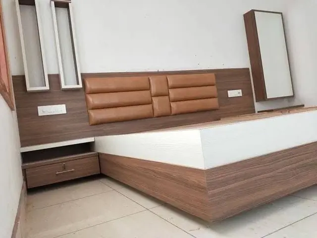 Leather-padded headboard bed – Bed by Varnika Furnitures and Aluminium Works, Lucknow